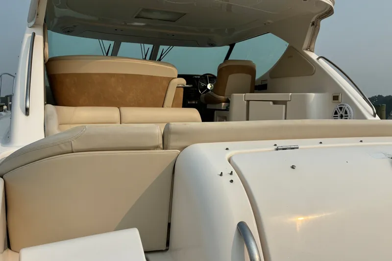 Slide: The Image of 2007 Tiara 3900 Sovran yacht interior with beige seating and helm station. - 60