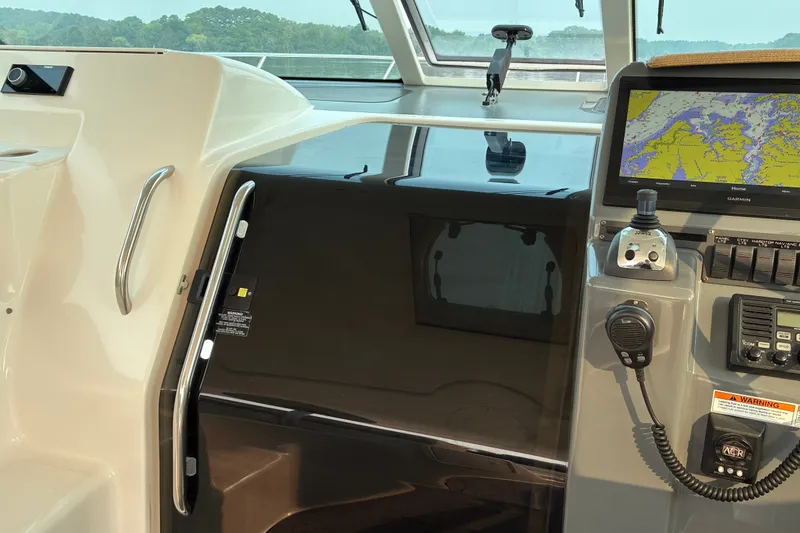 Slide: The Image of Interior helm of 2007 Tiara 3900 Sovran yacht with navigation equipment. - 42
