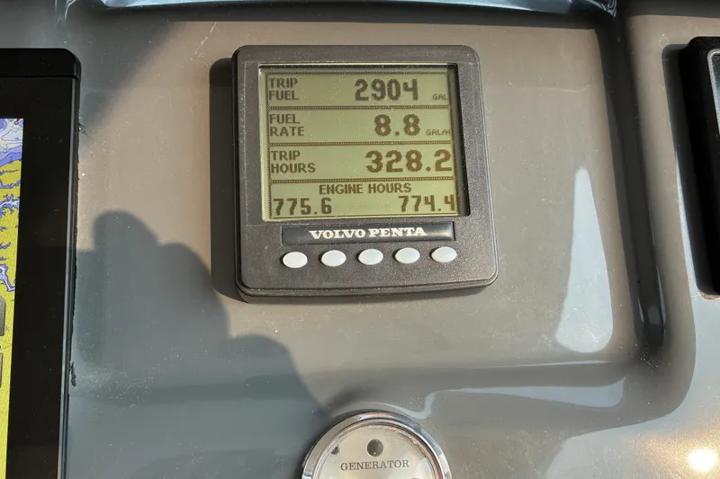 Slide: The Image of Volvo Penta display showing fuel and engine data on a 2007 Tiara 3900 Sovran. - 35