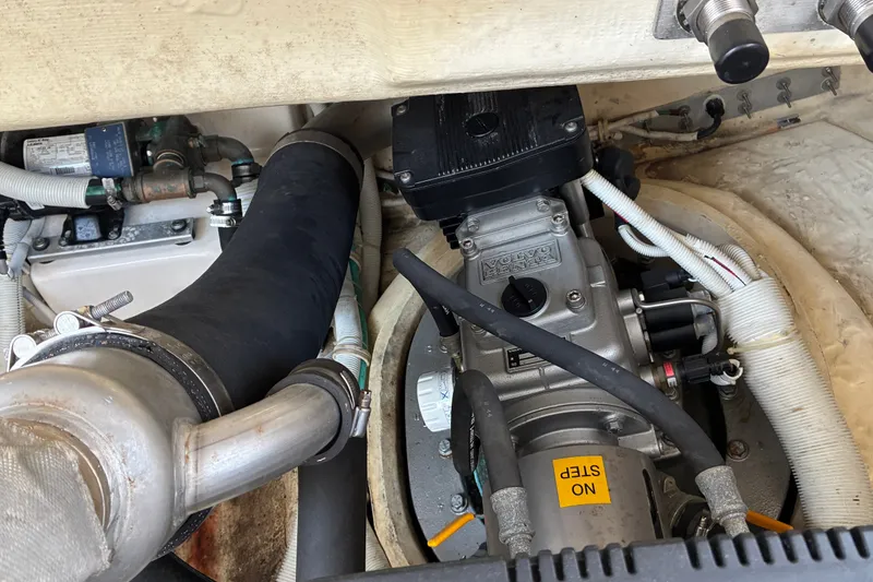 Slide: The Image of Engine compartment of a 2007 Tiara 3900 Sovran boat, featuring Volvo Penta components. - 64