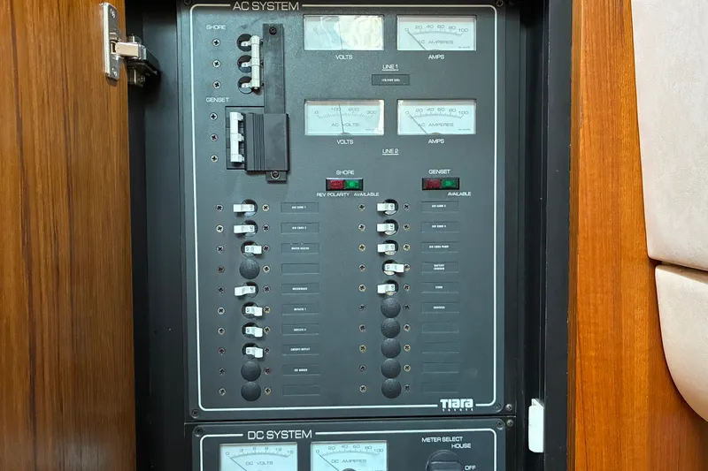 Slide: The Image of Electrical control panel on a 2007 Tiara 3900 Sovran yacht. - 59