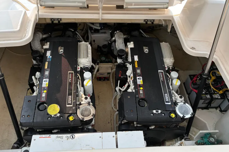 Slide: The Image of Engine compartment of a 2007 Tiara 3900 Sovran boat, featuring dual Volvo Penta engines. - 62