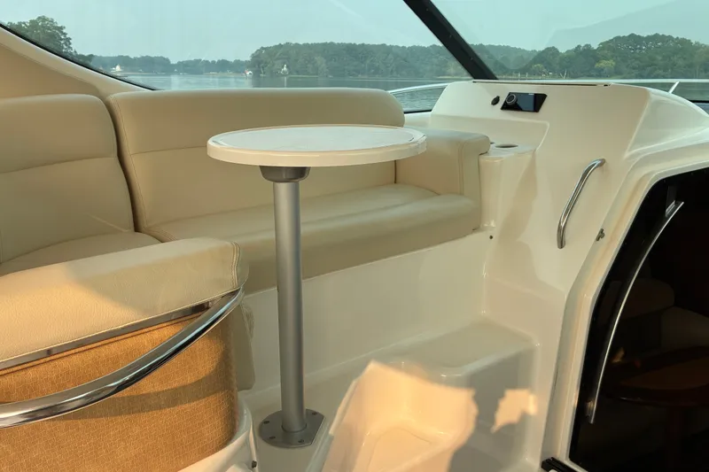 Slide: The Image of Luxurious interior of 2007 Tiara 3900 Sovran yacht with seating and table. - 27