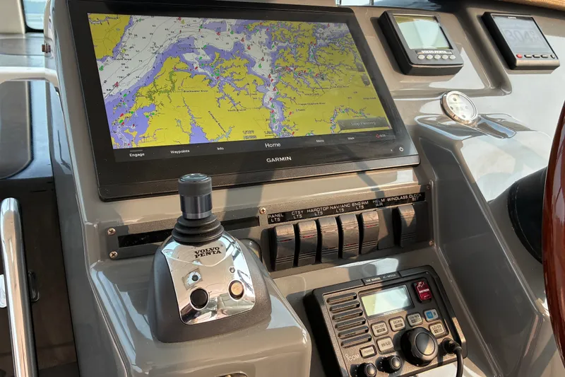 Slide: The Image of Cockpit of 2007 Tiara 3900 Sovran with Garmin navigation and Volvo Penta controls. - 33