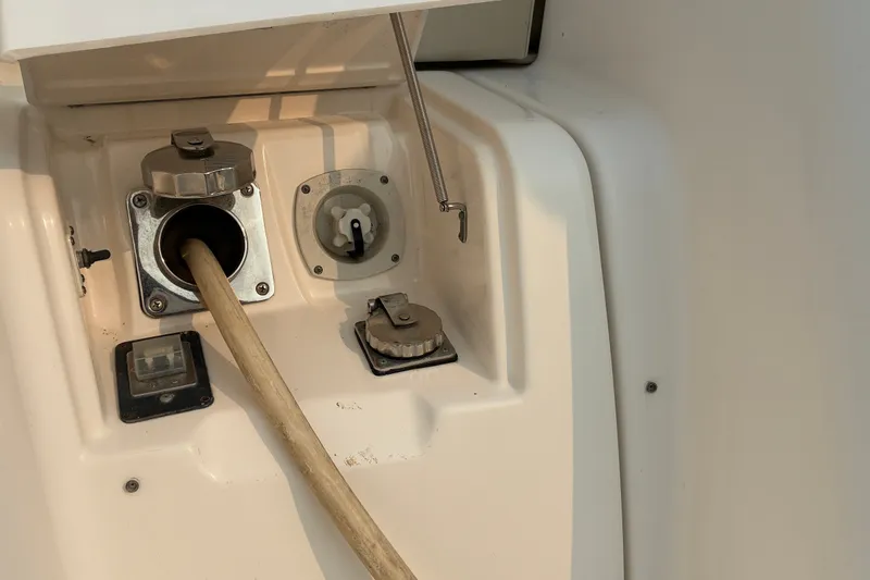 Slide: The Image of 2007 Tiara 3900 Sovran yacht fuel and water intake panel. - 69