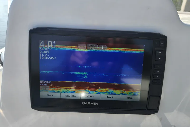 Slide: The Image of Garmin fishfinder display on 2023 Tidewater 196 CC Adventure boat, showing depth and temperature. - 56