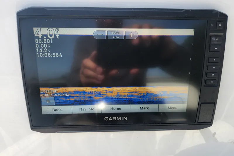 Slide: The Image of Garmin marine display on 2023 Tidewater 196 CC Adventure, showing sonar and navigation data. - 57