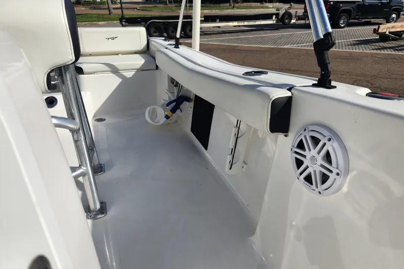 Slide: The Image of 2023 Tidewater 196 CC Adventure boat interior with seating and speaker. - 47