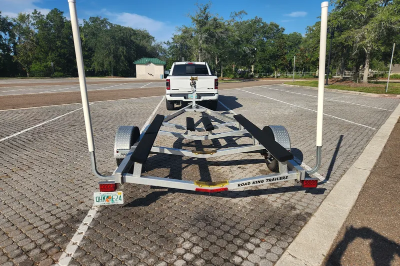 Slide: The Image of Trailer for 2023 Tidewater 196 CC Adventure boat in parking lot. - 62