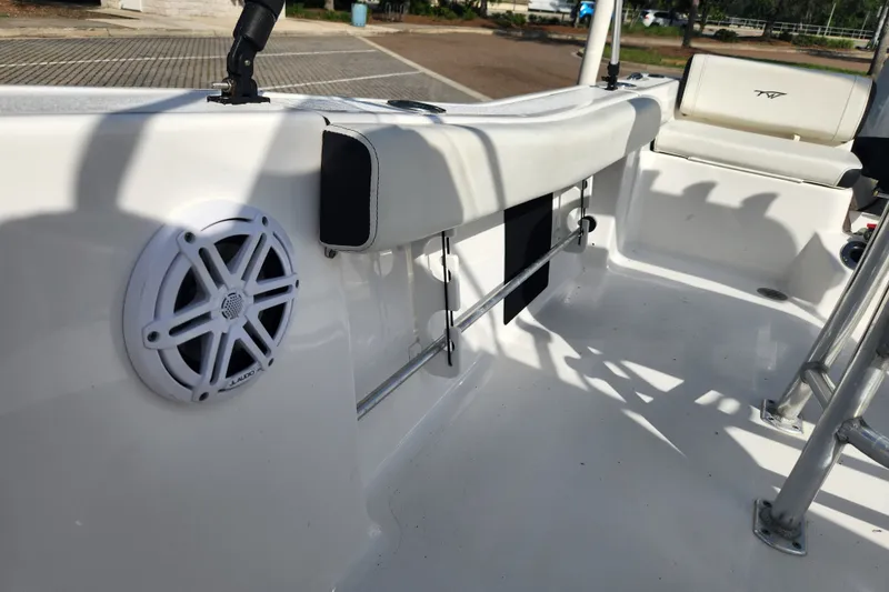 Slide: The Image of 2023 Tidewater 196 CC Adventure boat interior with speaker and seating. - 46