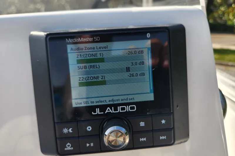 Slide: The Image of JL Audio MediaMaster 50 display on 2023 Tidewater 196 CC Adventure boat. - 58