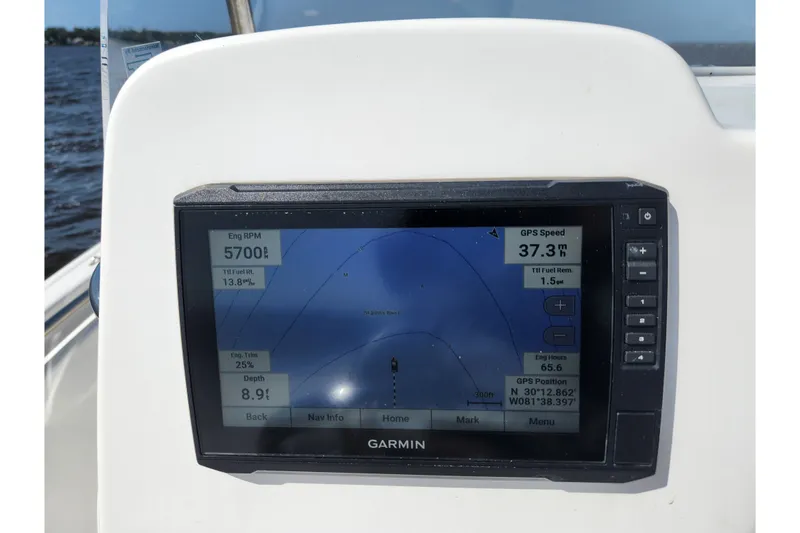 Slide: The Image of Garmin GPS display on 2023 Tidewater 196 CC Adventure boat, showing speed and engine data. - 61