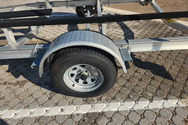 Slide: The Image of Trailer wheel and fender for 2023 Tidewater 196 CC Adventure boat. - 66
