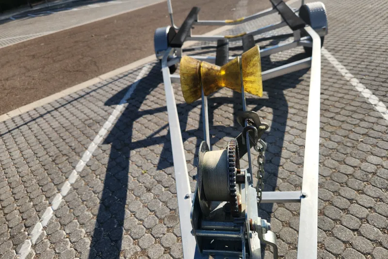 Slide: The Image of Boat trailer for 2023 Tidewater 196 CC Adventure on paved surface. - 63