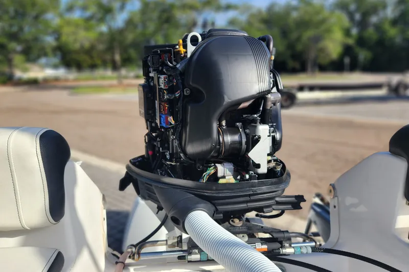 Slide: The Image of 2023 Tidewater 196 CC Adventure boat engine, detailed view in outdoor setting. - 27