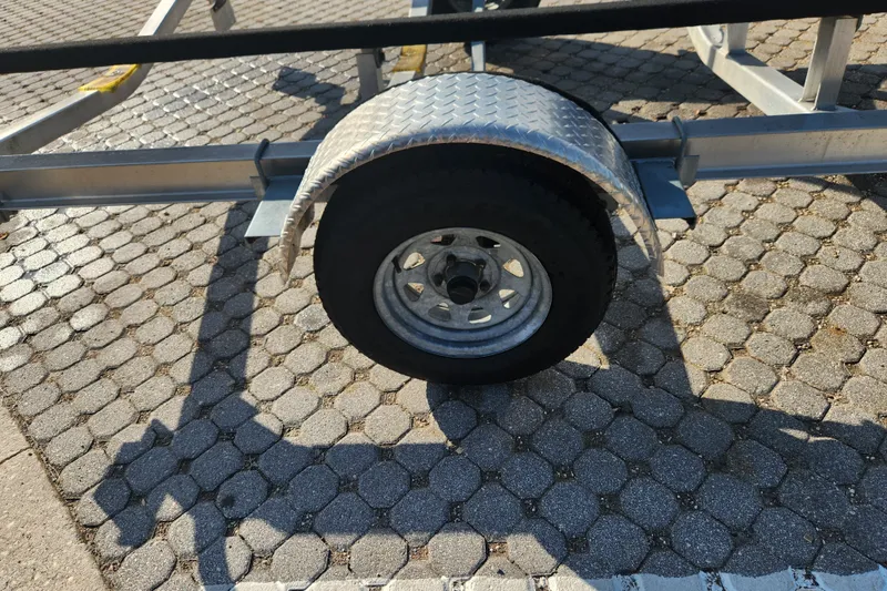 Slide: The Image of Trailer wheel of 2023 Tidewater 196 CC Adventure on paved surface. - 65