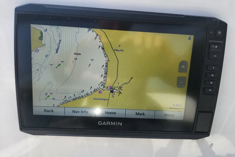 Slide: The Image of Garmin navigation system displaying a nautical map on a 2023 Tidewater 196 CC Adventure boat. - 55