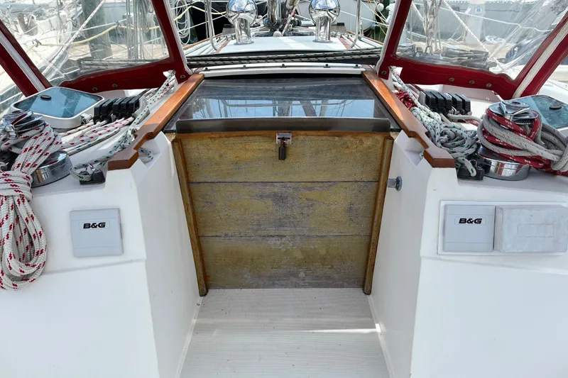 Slide: The Image of Cockpit of 1989 CAL 39 sailboat with ropes and B&G equipment. - 31