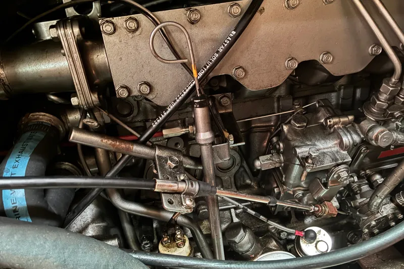 Slide: The Image of Close-up of a 1989 CAL 39 engine, showcasing intricate mechanical components and wiring. - 6