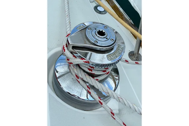 Slide: The Image of Sailboat winch with rope on a 1989 CAL 39 yacht deck. - 32