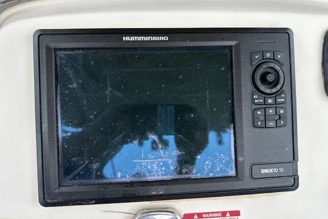 Slide: The Image of Humminbird ONIX10 SI fishfinder on 2012 Scout 210 XSF boat dashboard. - 11