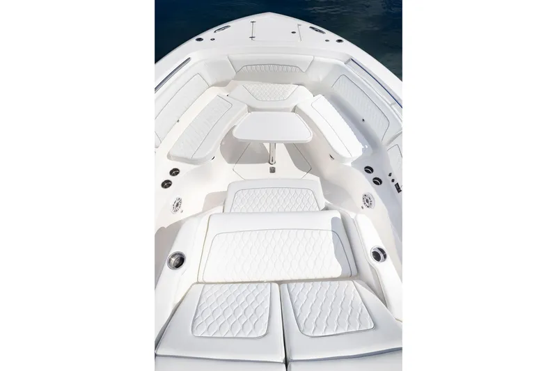 Slide: The Image of Luxurious seating area on the 2027 Pursuit S 388 Sport boat, featuring white quilted upholstery. - 4