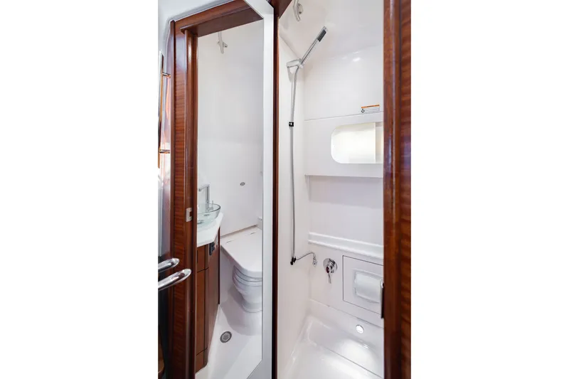 Slide: The Image of Luxurious bathroom interior of 2027 Pursuit S 388 Sport boat, featuring modern fixtures and sleek design. - 31