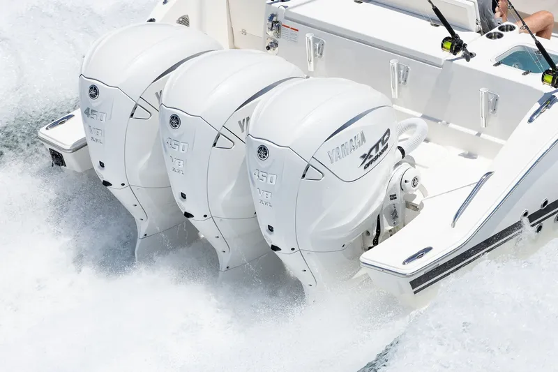 Slide: The Image of 2027 Pursuit S 388 Sport boat with triple Yamaha 450 V8 engines in action. - 27