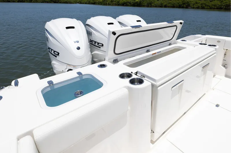 Slide: The Image of 2027 Pursuit S 388 Sport boat with Yamaha XTO engines and sleek deck features. - 24