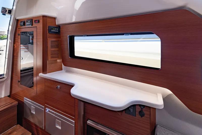 Slide: The Image of Luxurious interior of 2027 Pursuit S 388 Sport boat with sleek wood finish. - 28