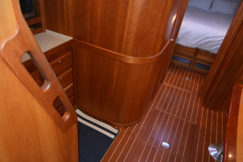 Slide: The Image of Interior of 2005 Sabre 38 Express yacht with wooden cabinetry and flooring. - 63
