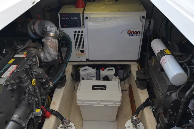 Slide: The Image of Engine room of a 2005 Sabre 38 Express with Onan marine generator. - 97