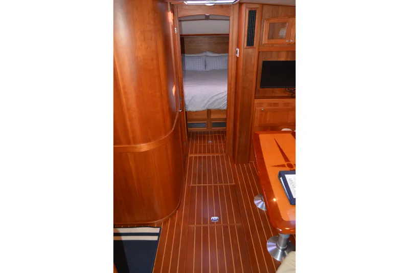 Slide: The Image of Interior of 2005 Sabre 38 Express yacht with wood finish and cozy cabin. - 66