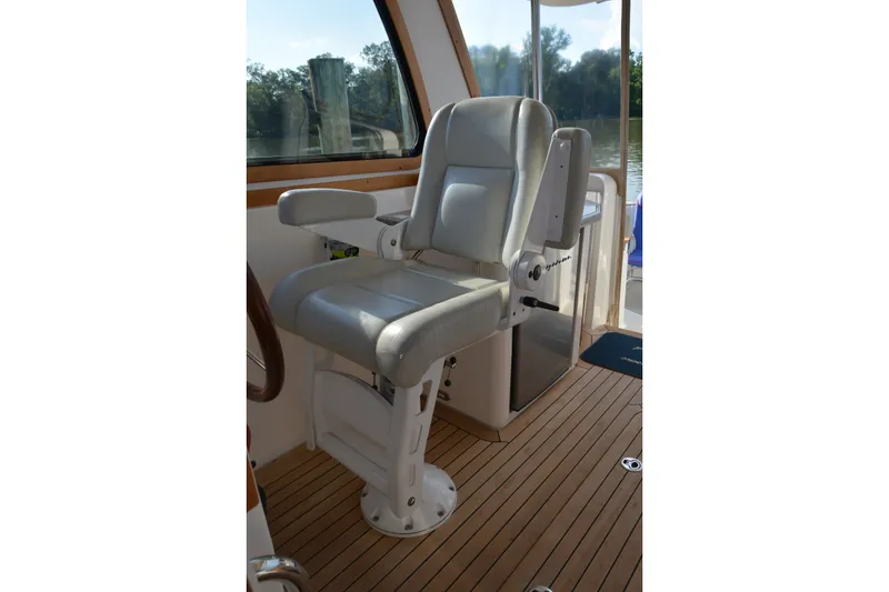 Slide: The Image of Captain's chair on 2005 Sabre 38 Express yacht, featuring sleek design and comfortable seating. - 56