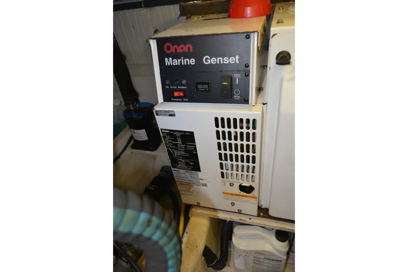 Slide: The Image of Onan marine generator in 2005 Sabre 38 Express boat engine room. - 111