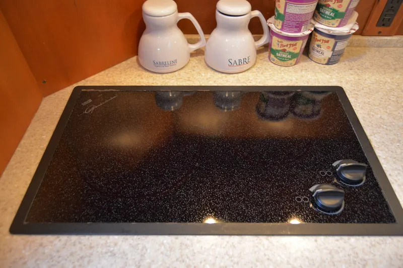 Slide: The Image of Ceramic cooktop on Sabre 38 Express yacht, 2005 model, with countertop accessories. - 70
