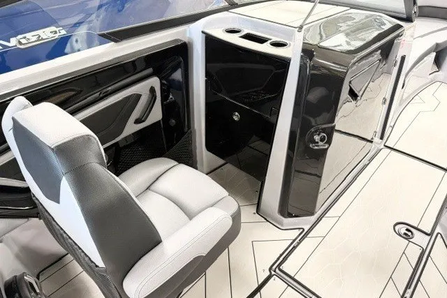 Slide: The Image of 2026 Yamaha Boats 255XD interior with sleek seating and modern console design. - 12