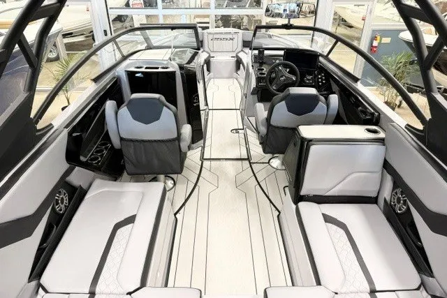Slide: The Image of 2026 Yamaha Boats 255XD interior showcasing modern seating and sleek design. - 19
