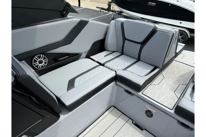 Slide: The Image of 2026 Yamaha Boats 255XD interior with modern seating and sleek design. - 27