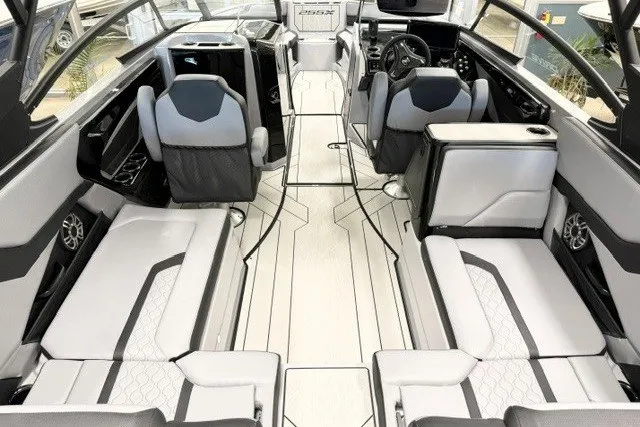 Slide: The Image of 2026 Yamaha Boats 255XD interior with modern seating and sleek design. - 7
