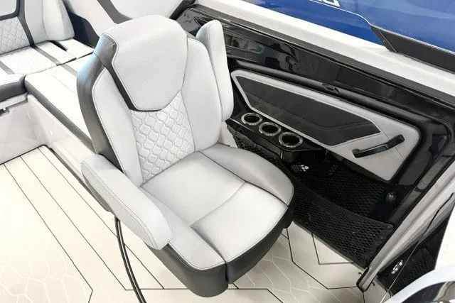 Slide: The Image of Luxurious interior of 2026 Yamaha Boats 255XD, featuring sleek seating and modern design elements. - 14