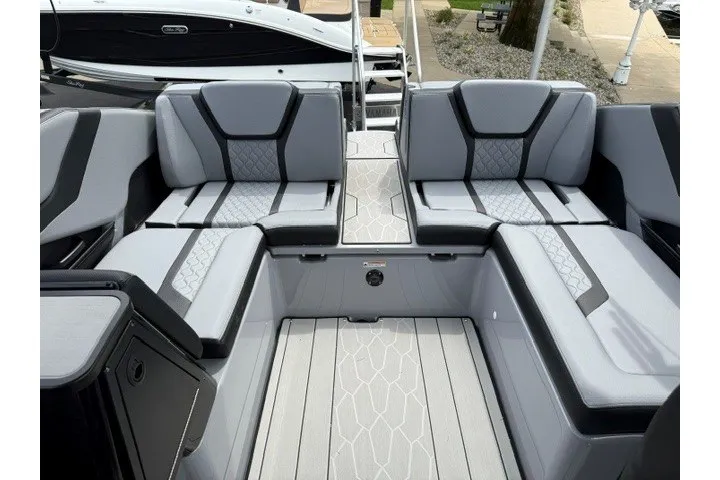 Slide: The Image of Luxury seating area on a 2026 Yamaha Boats 255XD, featuring modern design and comfort. - 28