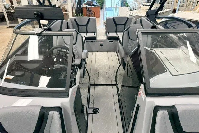 Slide: The Image of 2026 Yamaha Boats 255XD interior with sleek seating and modern design. - 18