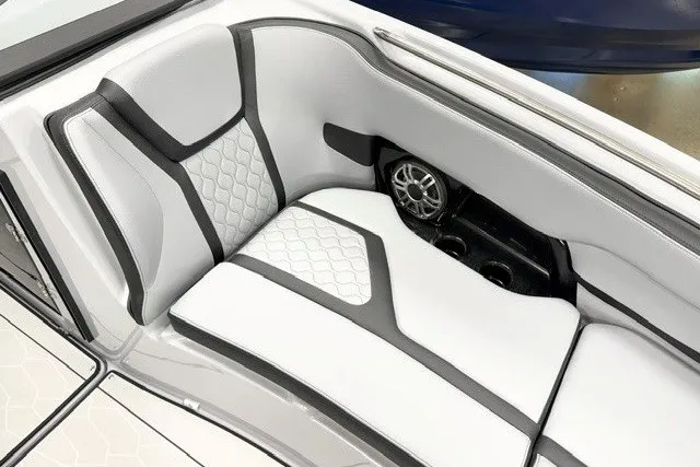 Slide: The Image of Luxury seating in 2026 Yamaha Boats 255XD, featuring sleek design and integrated speaker system. - 17