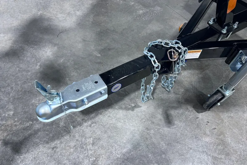 Slide: The Image of Trailer hitch and chain of 2026 Smoker Craft Excursion 166 SC boat. - 21