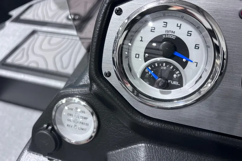 Slide: The Image of Dashboard of 2026 Smoker Craft Excursion 166 SC with RPM and fuel gauges. - 13