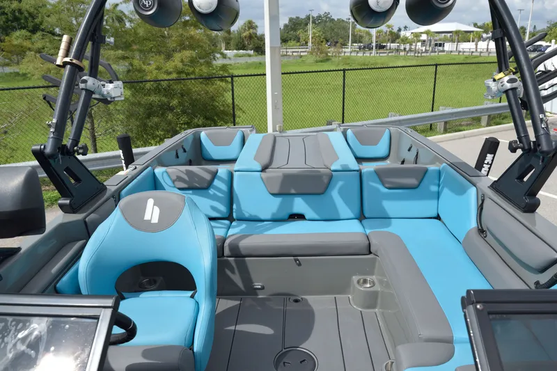 Slide: The Image of 2019 Heyday WT-2 boat interior with blue and gray seating, featuring a modern design. - 20