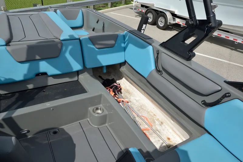Slide: The Image of Interior of a 2019 Heyday WT-2 boat with blue and gray seating. - 22
