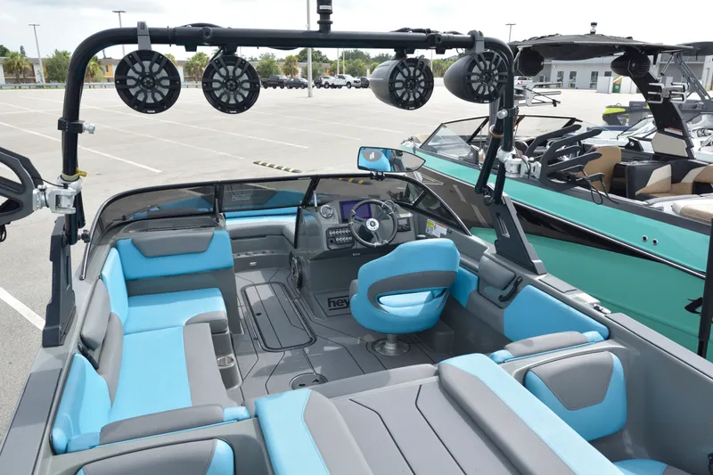 Slide: The Image of 2019 Heyday WT-2 boat interior with blue seating and advanced audio system. - 16