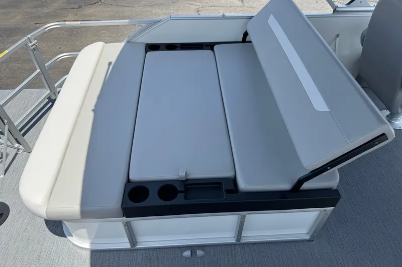 Slide: The Image of 2027 Godfrey Xperience 2286 Flip Lounge boat seating with cup holders, gray upholstery. - 17
